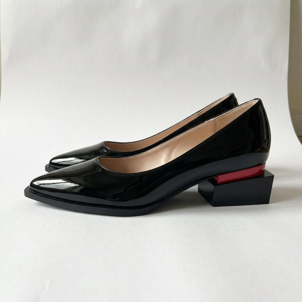Patent leather dress shoes with architectural heel